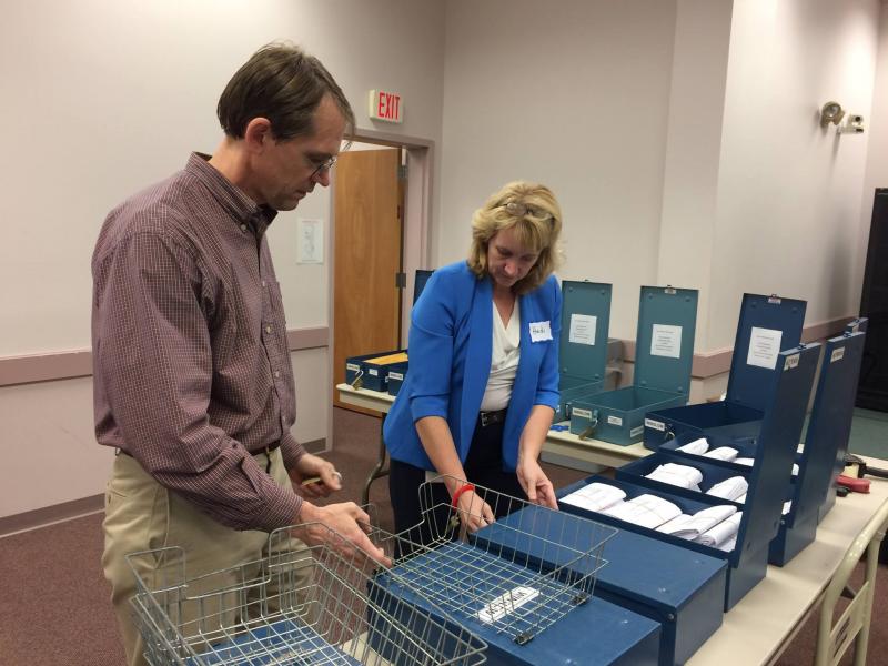 Recount of Question 2 ballots begins Thursday; Question 1 begins Monday. Question 1 would legalize marijuana for recreational use by adults 21 years of age or older. Official election night results show a difference of 4,073 votes. Question 2 would institute a 3 percent tax on individual Maine taxable income above $200,000 to go toward education expenses. Official election night results show a difference of 9,580 votes. Elections Division employees Jon and Heidi open ballot boxes for the recent House recount.